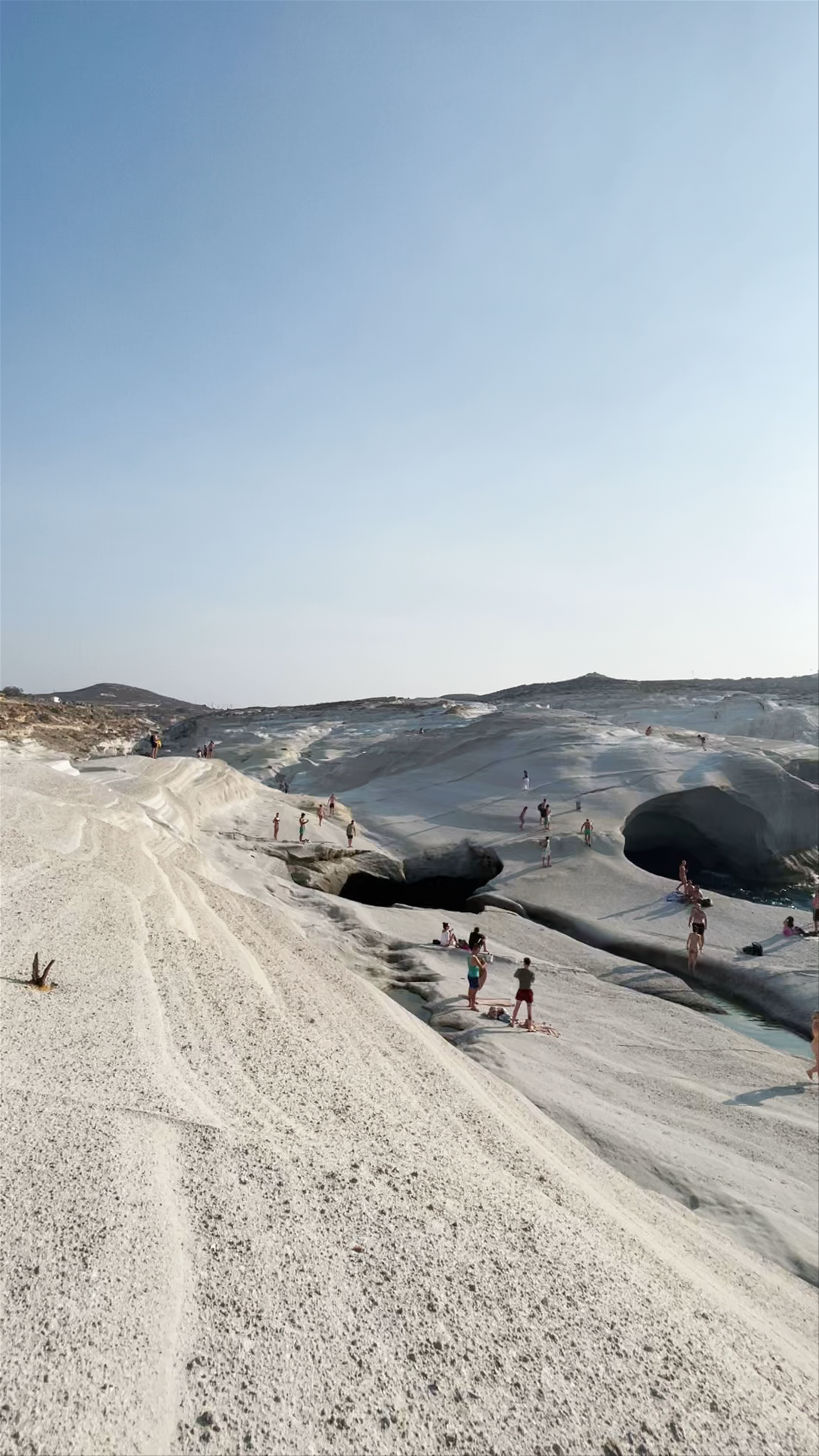 Sunlit Adventure on the White Rock Formations of Sarakiniko, Milos