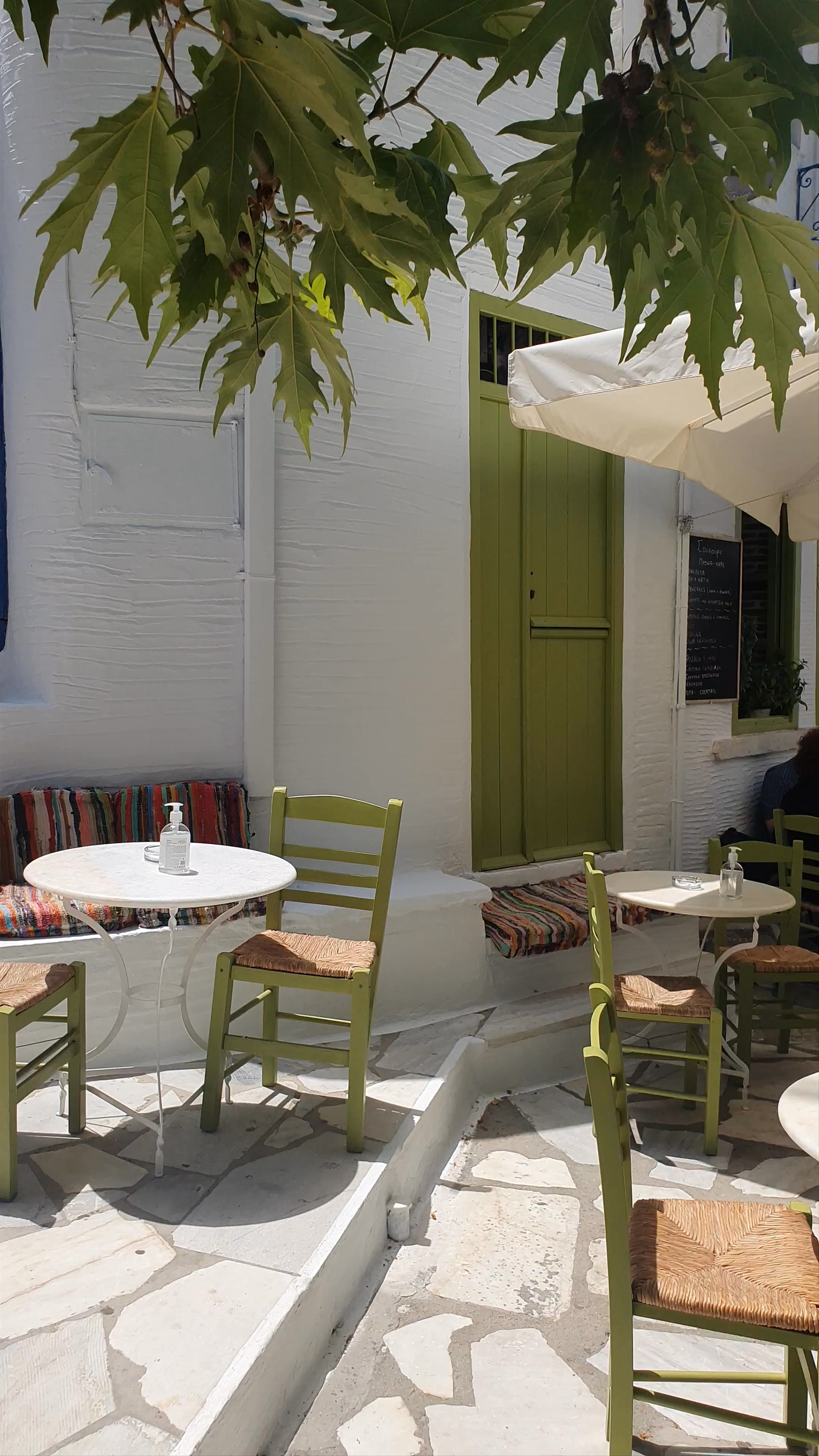Charming Afternoon at a Sunlit Café in Pyrgos, Greece