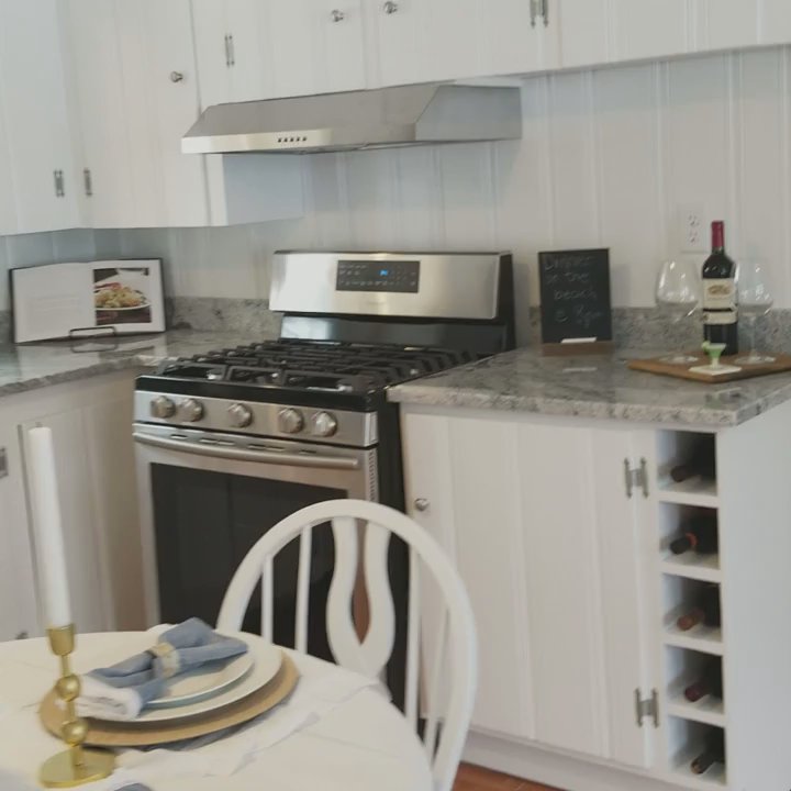 JMC Painting - Re-painted the kitchen cabinets white,  Originally they were stained - Painters Near Me