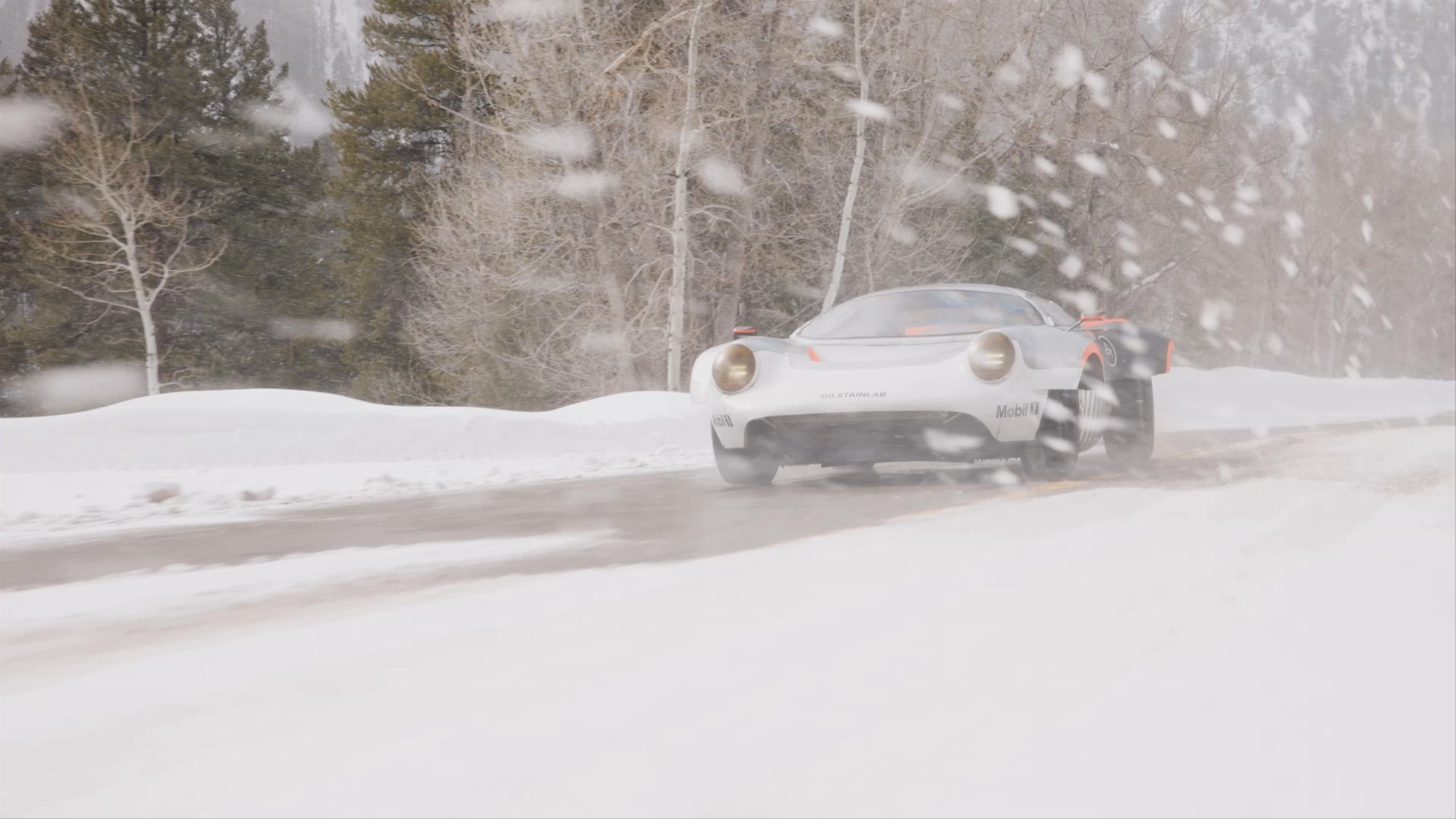 Video of Half11 prototype driving down road in blowing snow