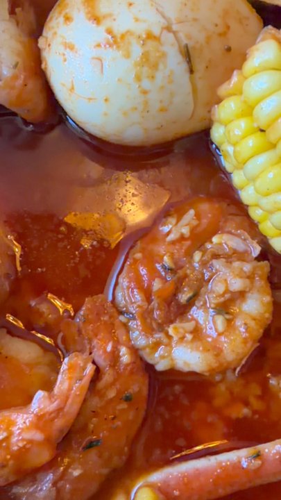 King Crab - As you can see my bag is still full haven't ate much & I found a hair in my food! - Seafood Near Me - Charlotte, North Carolina
