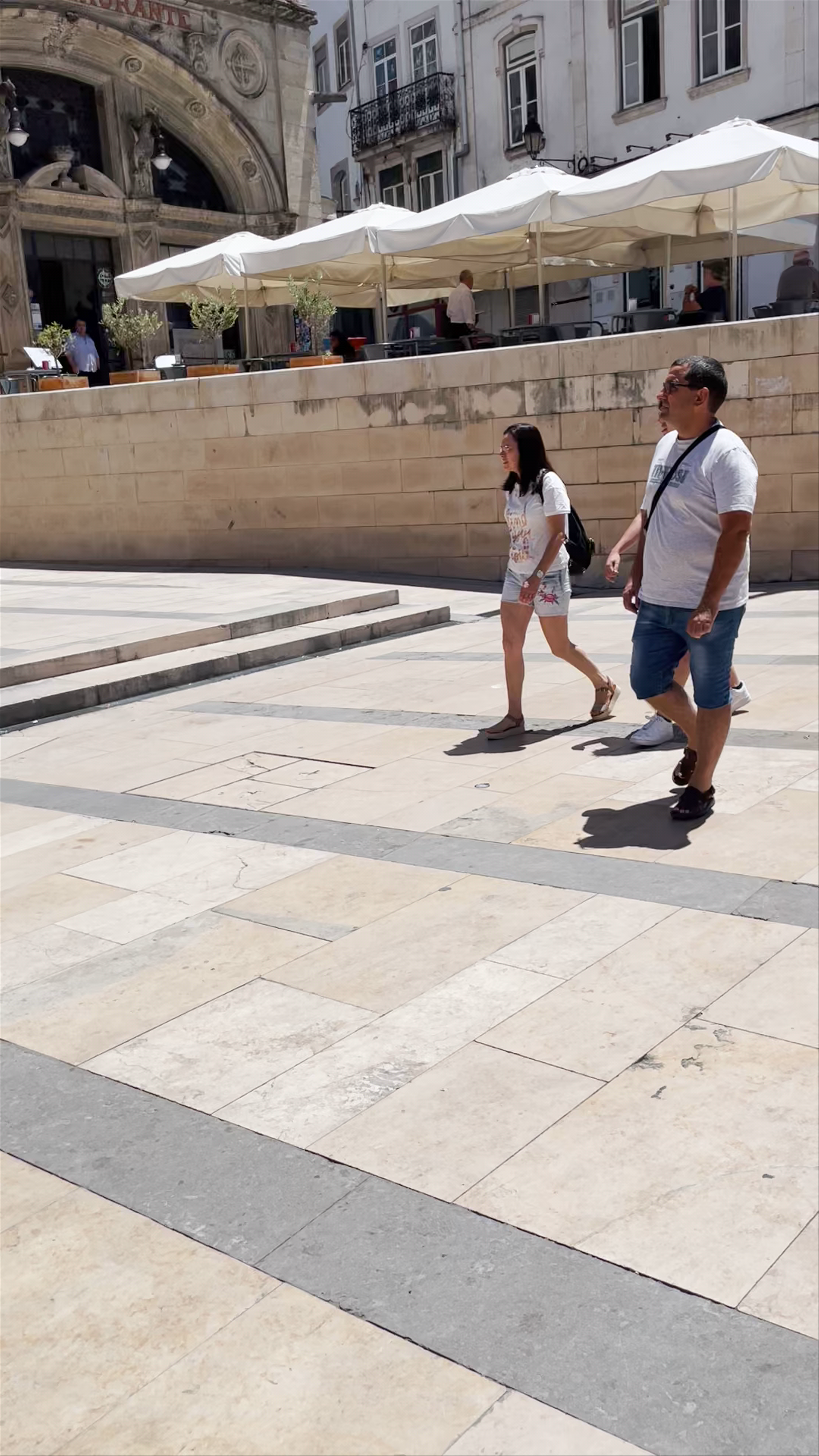 Exploring Santa Cruz Church and Praça 8 de Maio in Historic Coimbra