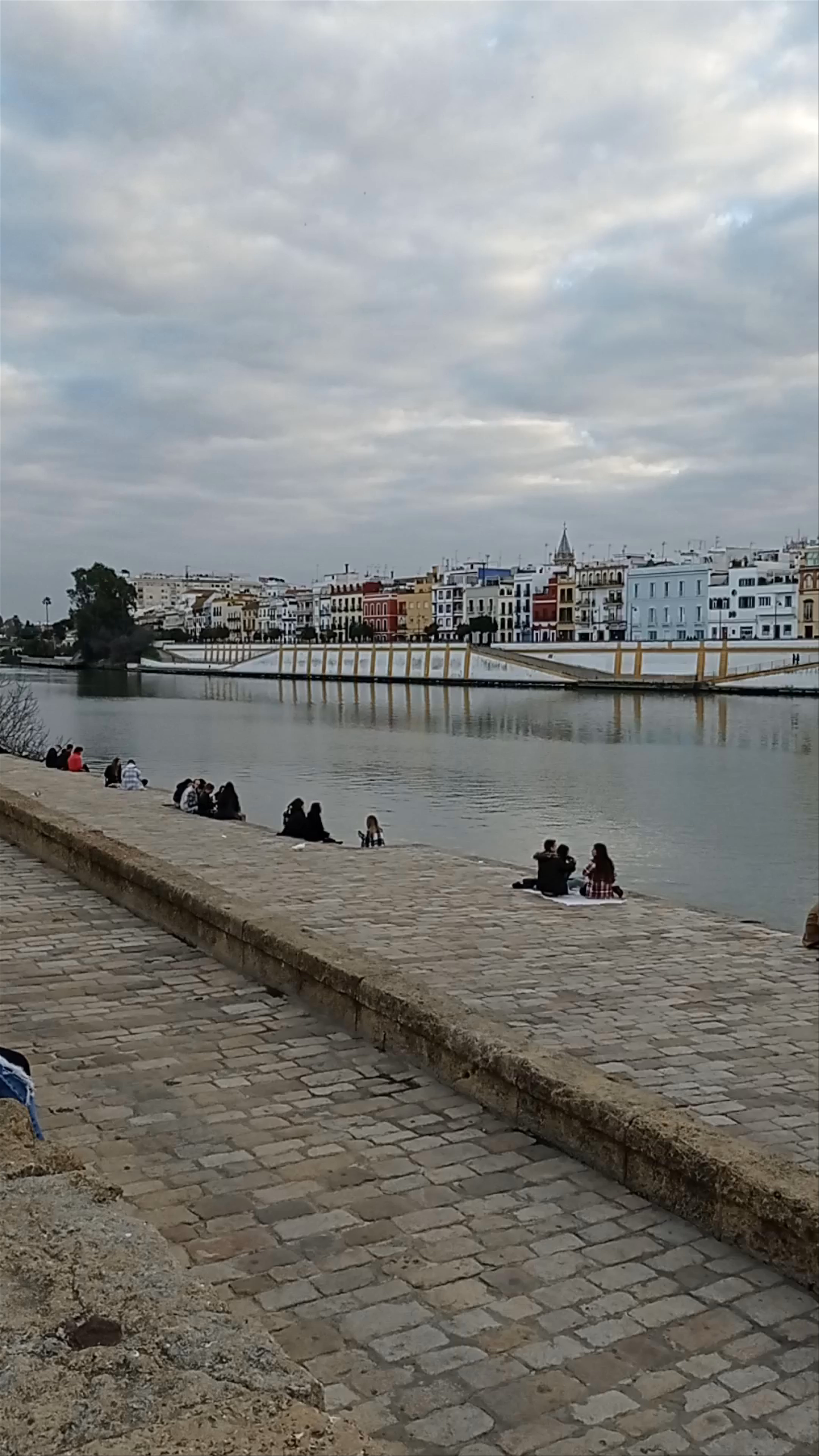 Puente de Triana: Riverside Serenity and Historic Views in Seville
