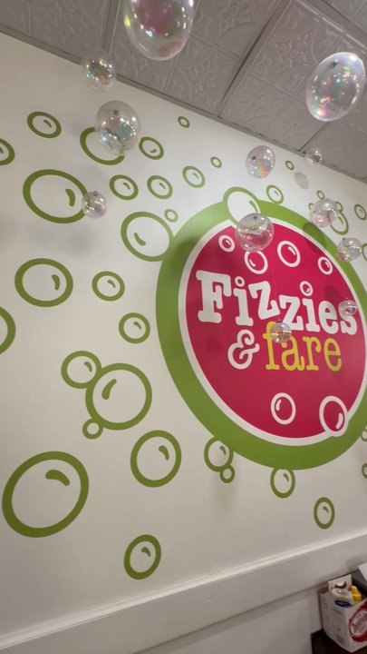 Fizzies & Fare - Cute mural along the back wall. Great for pics. - Desserts Near Me - Jacksonville, Florida