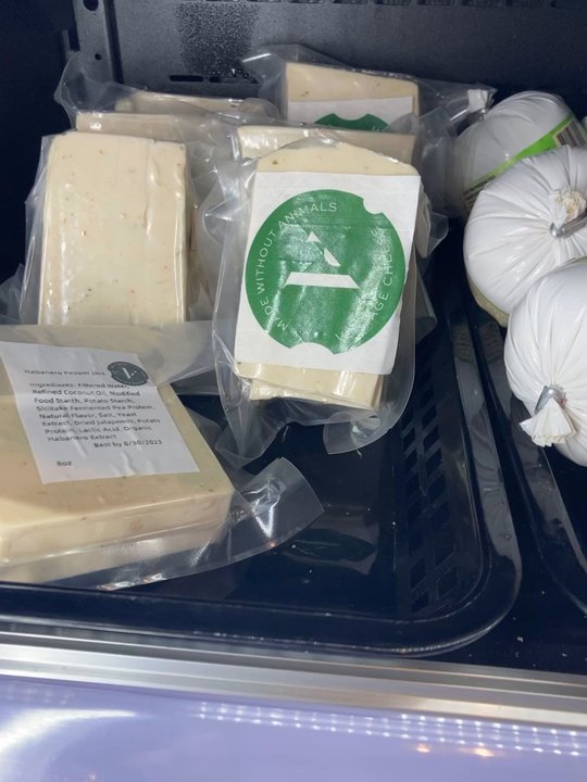 Pow Pow - Vertage cheese selection in the display case - Vegan Near Me - Washington, DC, District of Columbia
