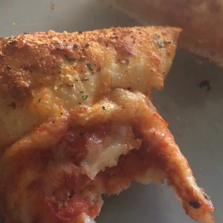 Hungry Howie's Pizza - Hair BAKED INTO THE PIZZA. I was so disgusted when I realized how much of the slice of eaten before I saw the strand. This is really gross. - Pizza Near Me - Clovis, California