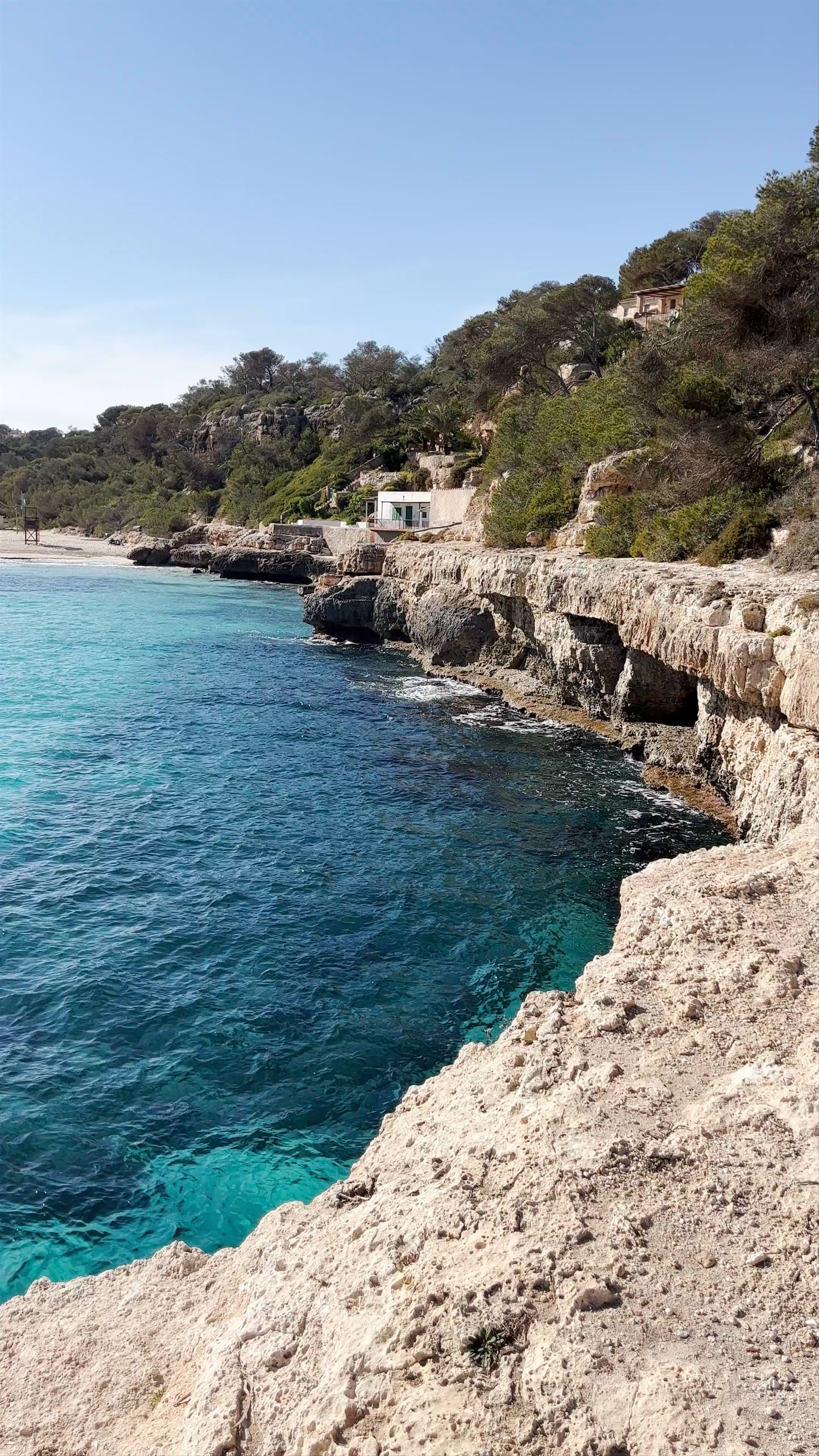 Turquoise Waters and Cliffside Serenity at Cala Llombards, Santanyí