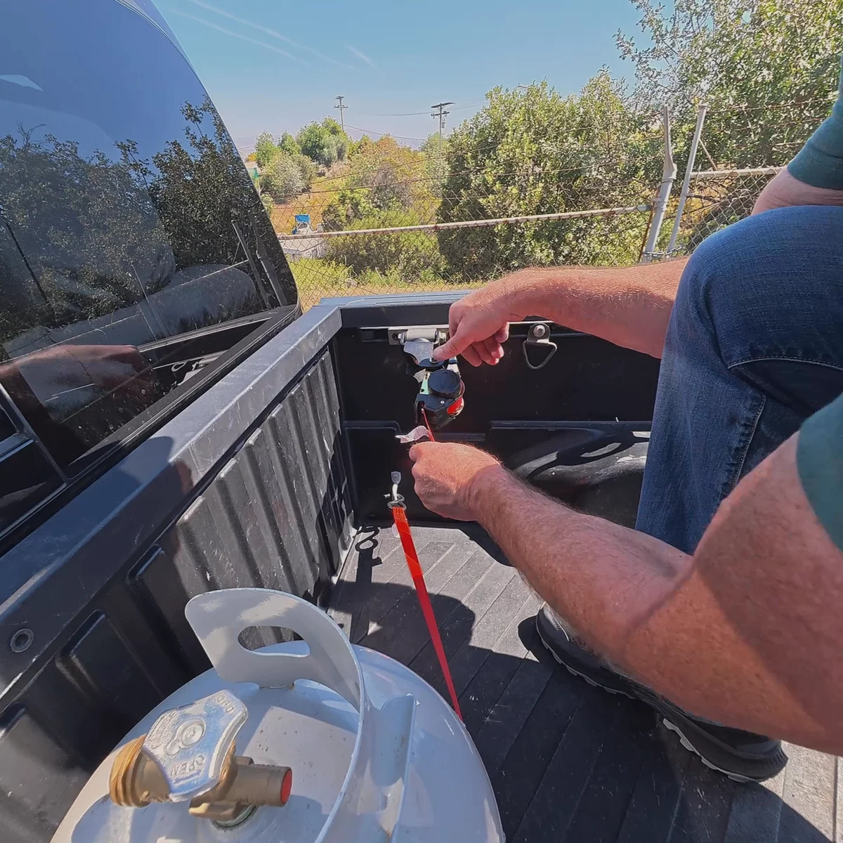 Ultimate Retractable Ratchet Straps® for Toyota Bed Rail in action