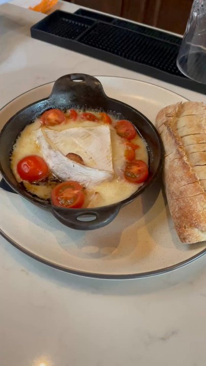 Vincent Restaurant - Can't find the correct name on the menu, but French bread with some type of cheese, basil sauce - New American Near Me - Chicago, Illinois