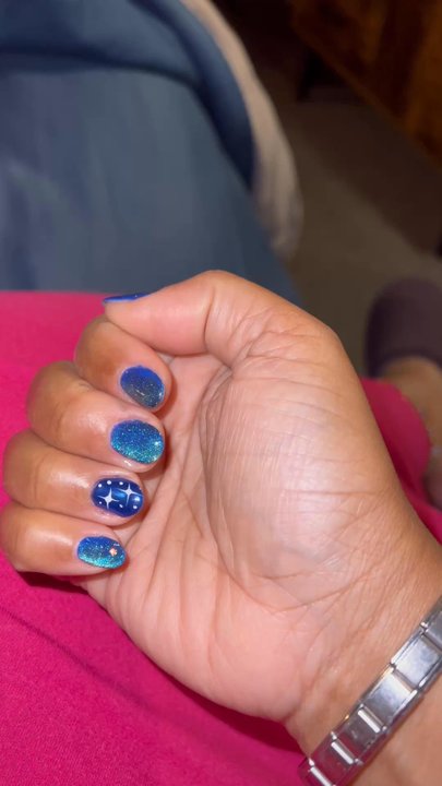 Bella Nails & Brows - LOVE this gel mani by Heather! I needed a blue wonderland and she nailed it. Blue cateye on berry blue, plus chrome accent nail with design - Nail Salons Near Me - La Mesa, California