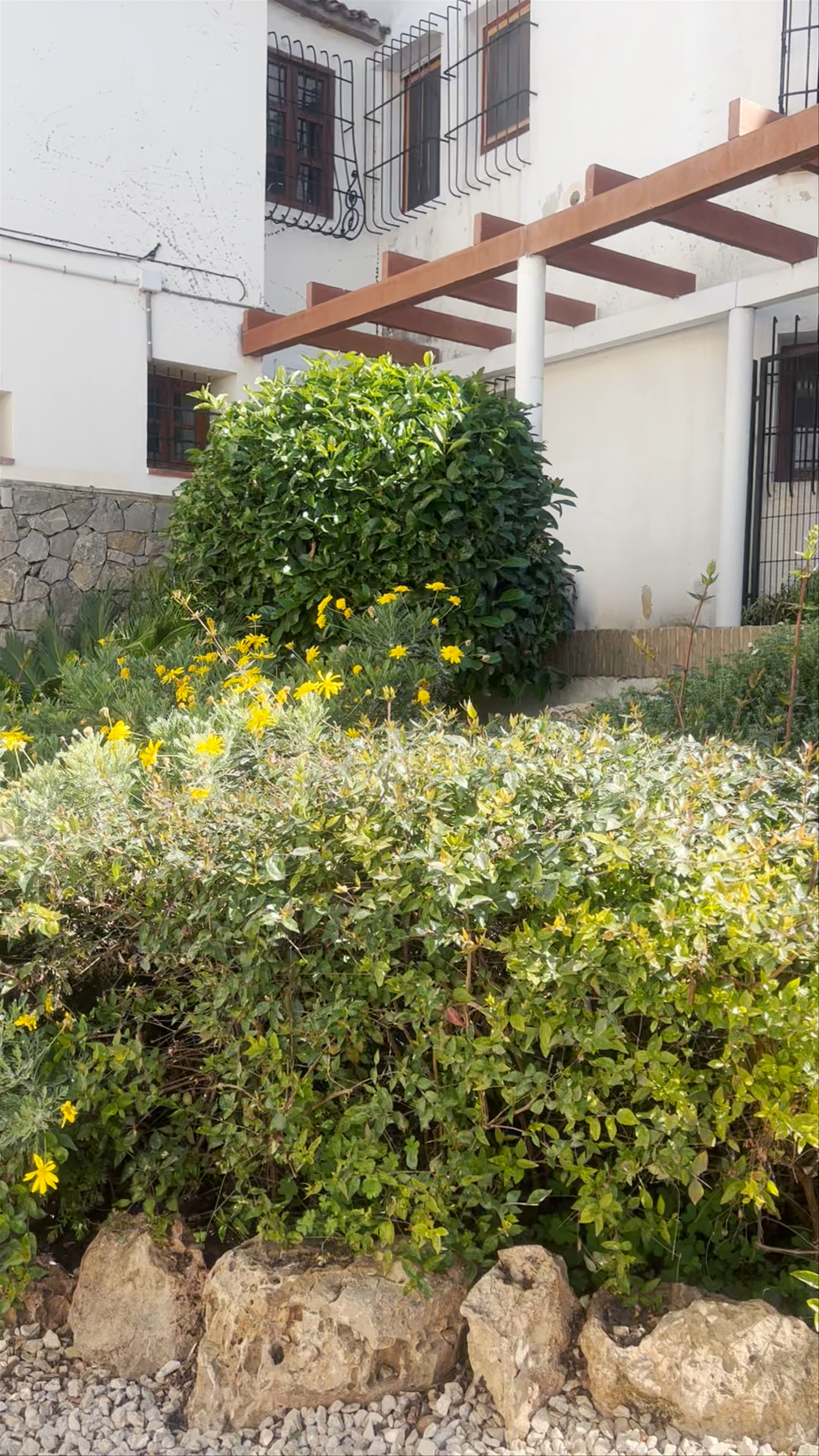 Stone Aqueduct Replica and Blooming Gardens in Altea, Spain
