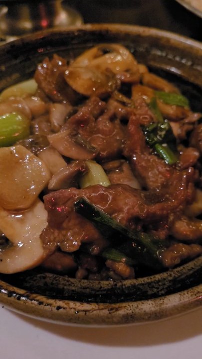 Chen Garden Restaurant - Sizzle of the ginger mushroom beef clay pot, kind of like a stewed beef with ginger - Chinese Near Me - Rochester, New York