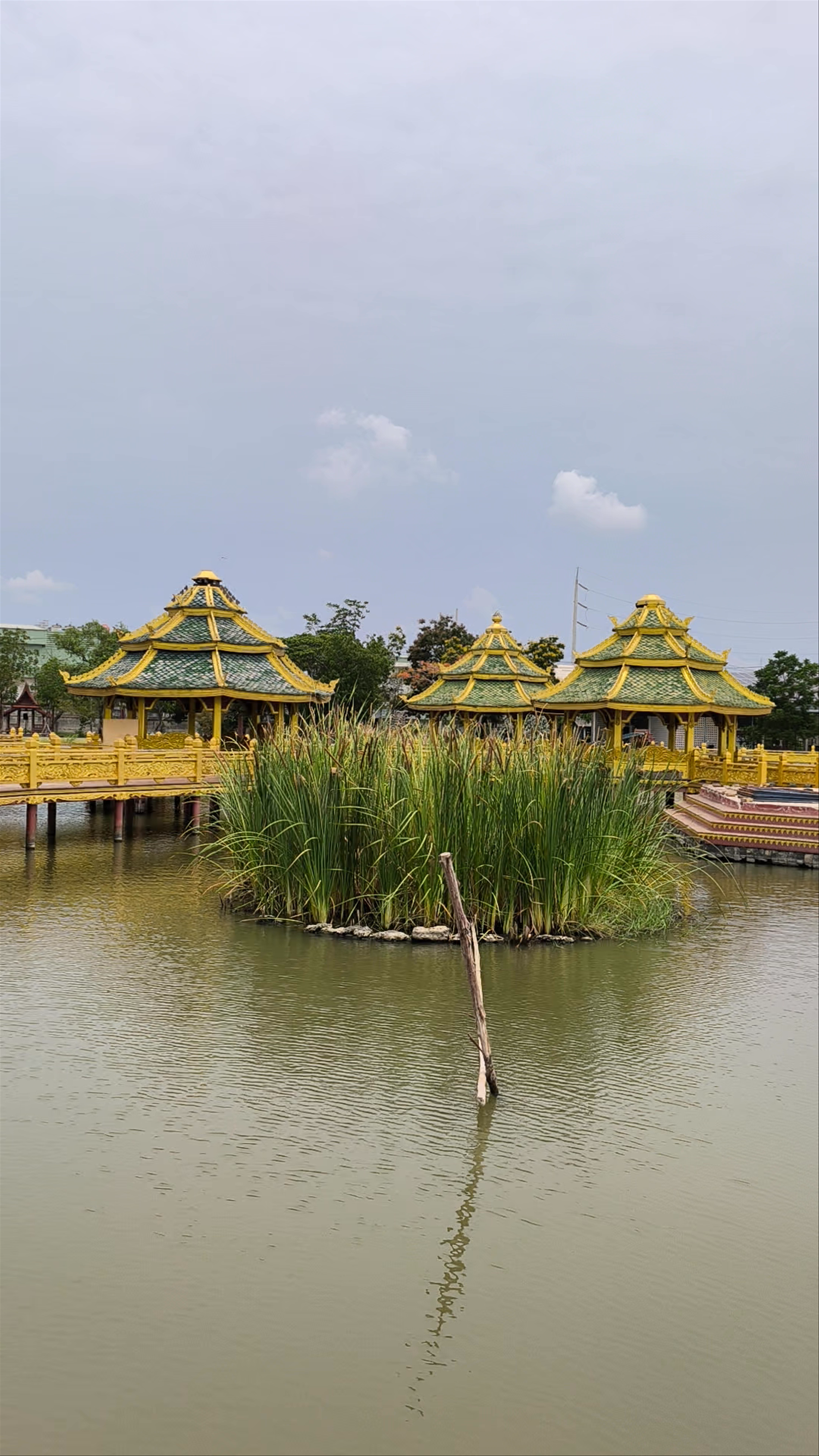 Pavilion of the Enlightened: A Serene Thai Waterfront Escape
