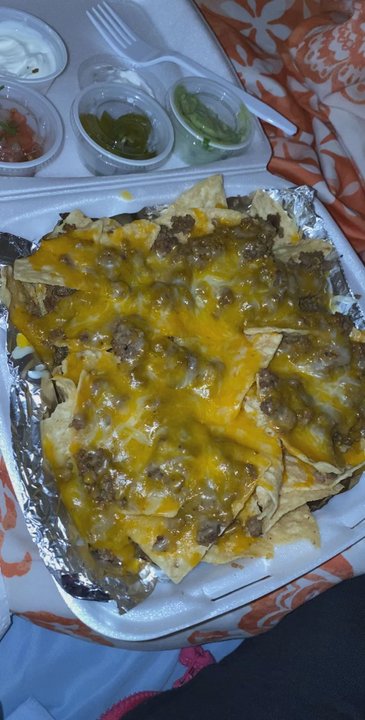 Mi Casita Mexican Food - Beef Fajita Nachos ordered though Door dash. Love these nachos! The ground beef and cheese are also good! - Mexican Near Me - Denton, Texas