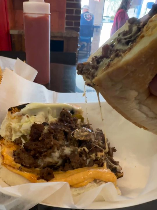 Belly Busters Restaurant - Steak and cheese. Comes with a special sauce that is - Burgers Near Me - Deland, Florida