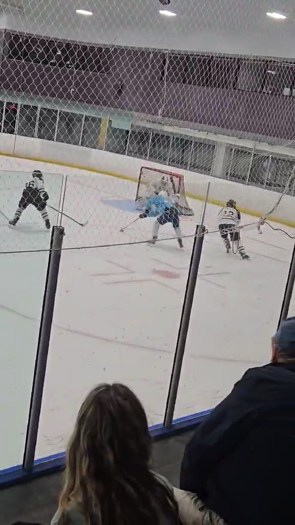 Rylan steals the puck and carries it out of the defensive zone down the ice for a nice move around a defender and beats the goalie with a silky smooth forehand to back hand goal!