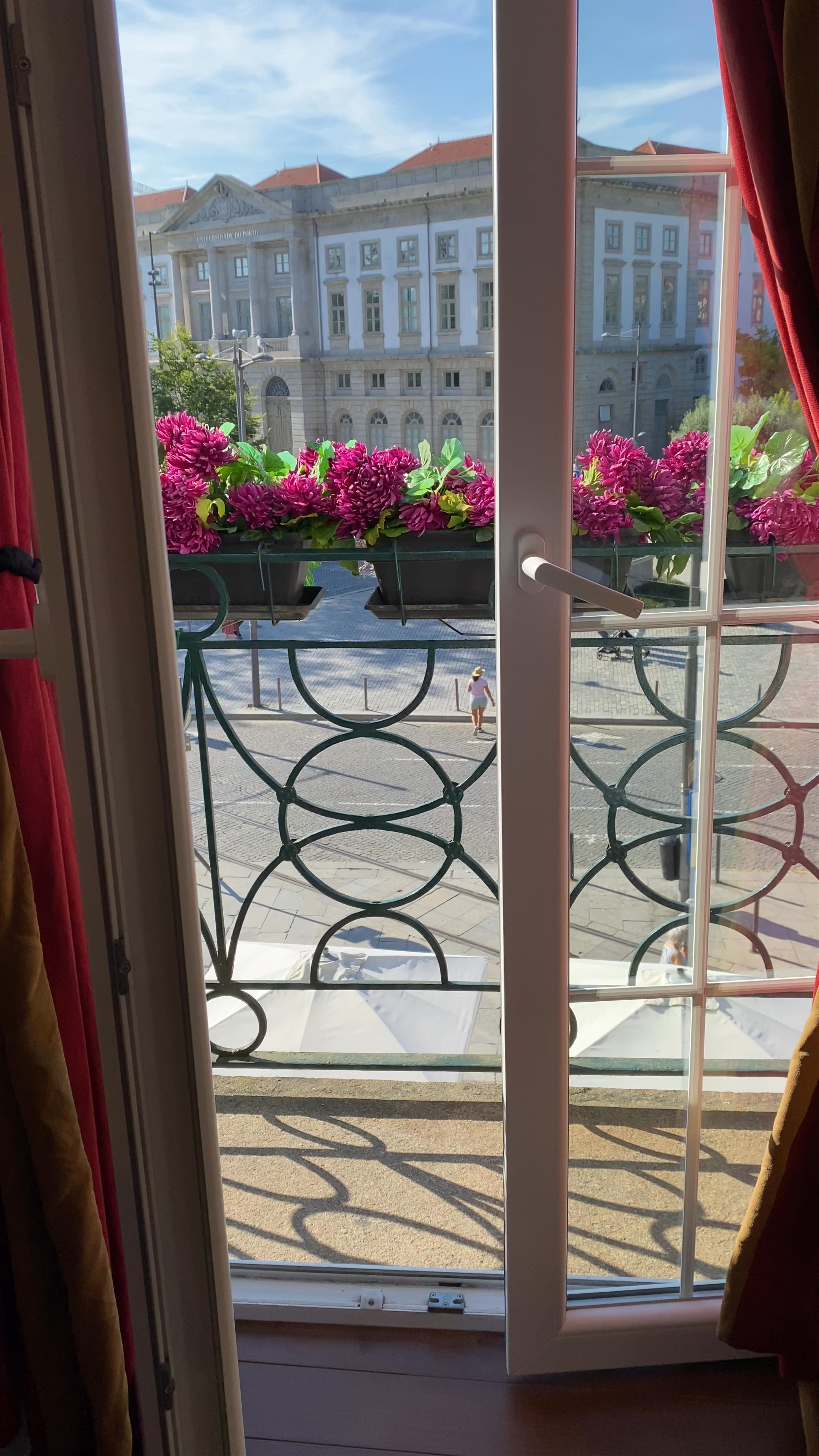 Sunlit Views from Liberdade Square Balcony, Porto