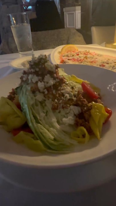Circe Prime - Wedge blue cheese salad, crumble bacon and extra blue cheese crumbles with tomato. - Steakhouses Near Me - Cranston, Rhode Island