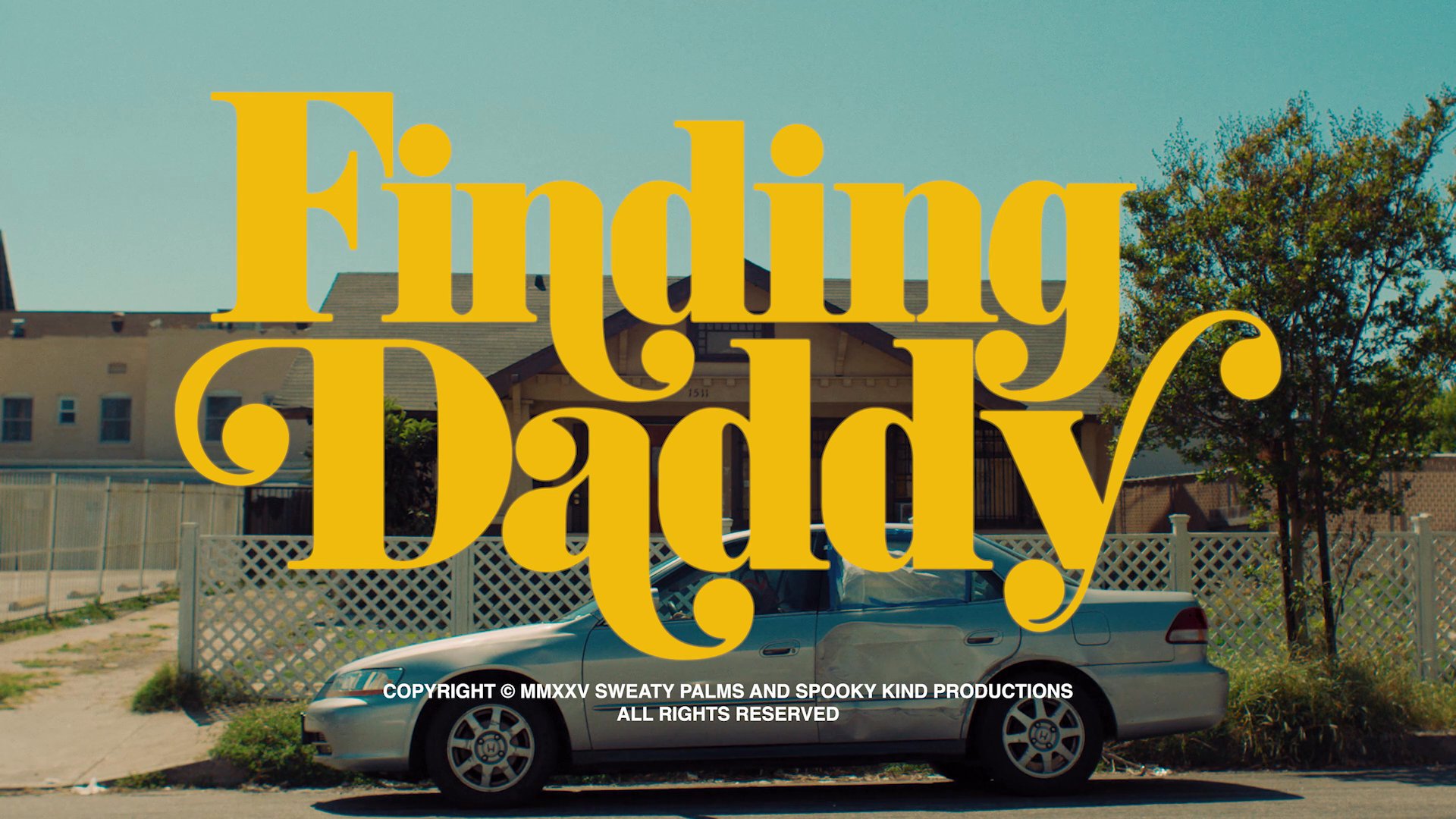 Two individuals sit inside a parked car before the film title appears on screen, transitioning to a close-up of them engaged in conversation.