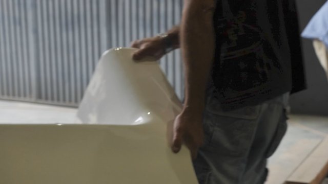 Carrying a ceramic toilet