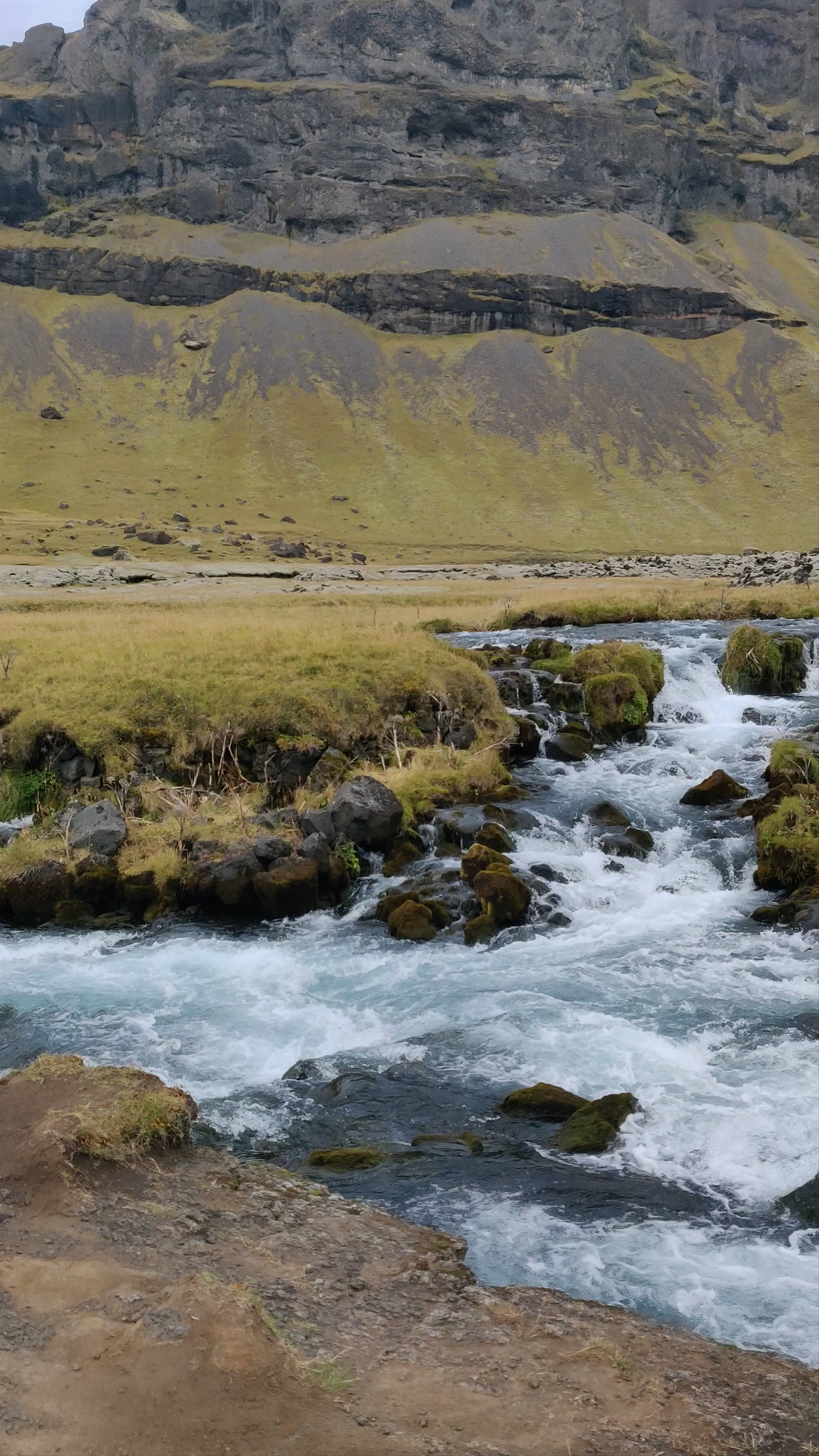 Fossálar Waterfall
