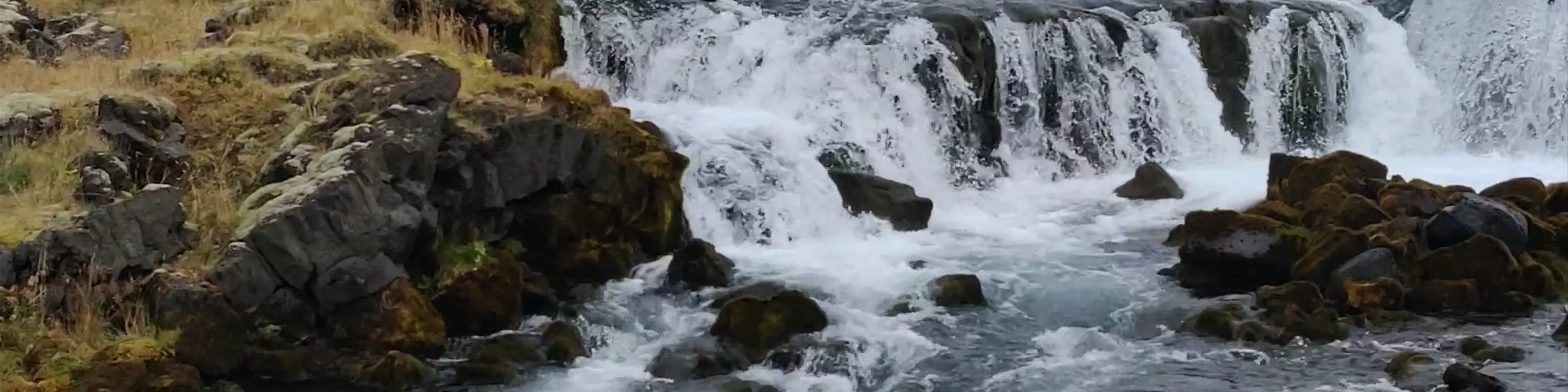Fossálar Waterfall