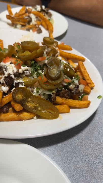 Los Andanes - Mother's Day yummies!! Carne Asada Fries, Enchiladas Verdes de pollo and, carne asada and pastor taco. - Mexican Near Me - Chicago, Illinois
