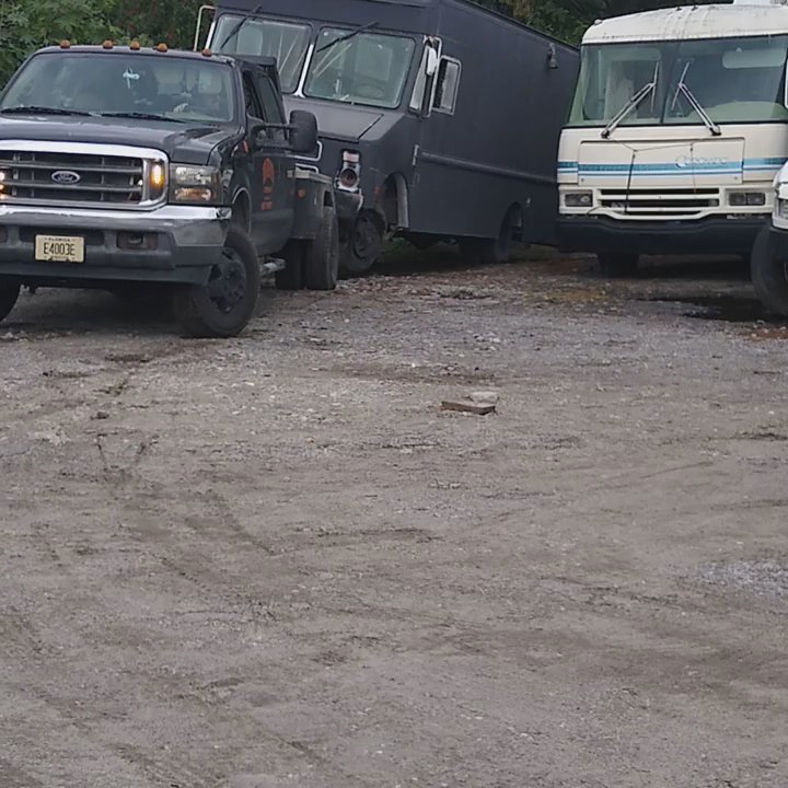 Florida SouthEastern Enterprises - E 350 with shot tires full of cooking appliances moved into small spot. - Vehicle Shipping Near Me - Orlando, Florida