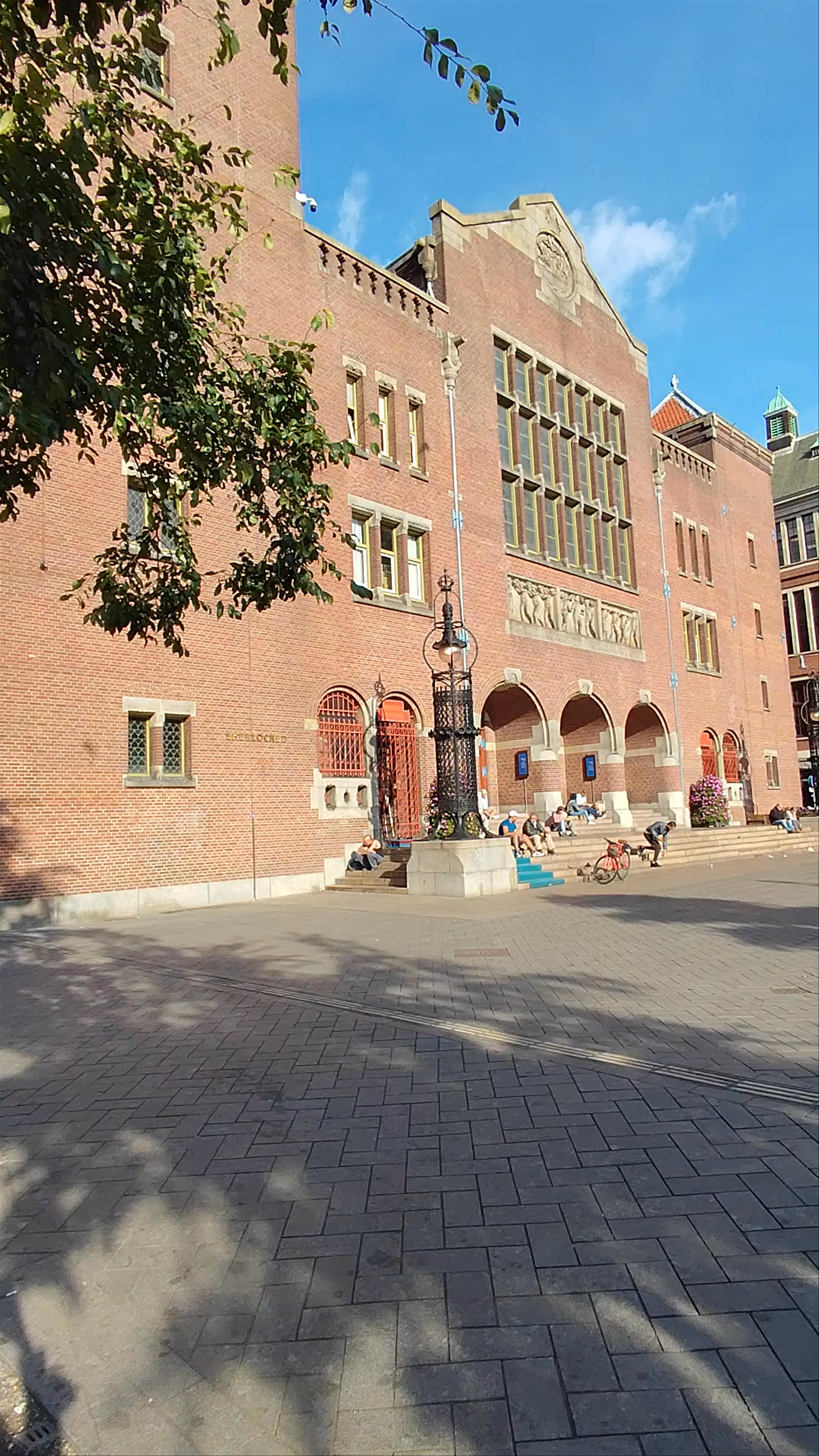 Sunlit Urban Charm at Beursplein, Amsterdam
