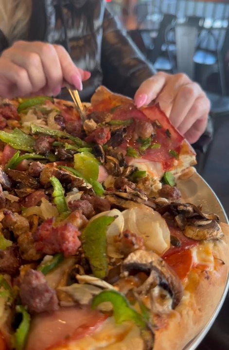 The Pie Pizzeria - Midvale - Cheese pull - Pizza Near Me - Midvale, Utah