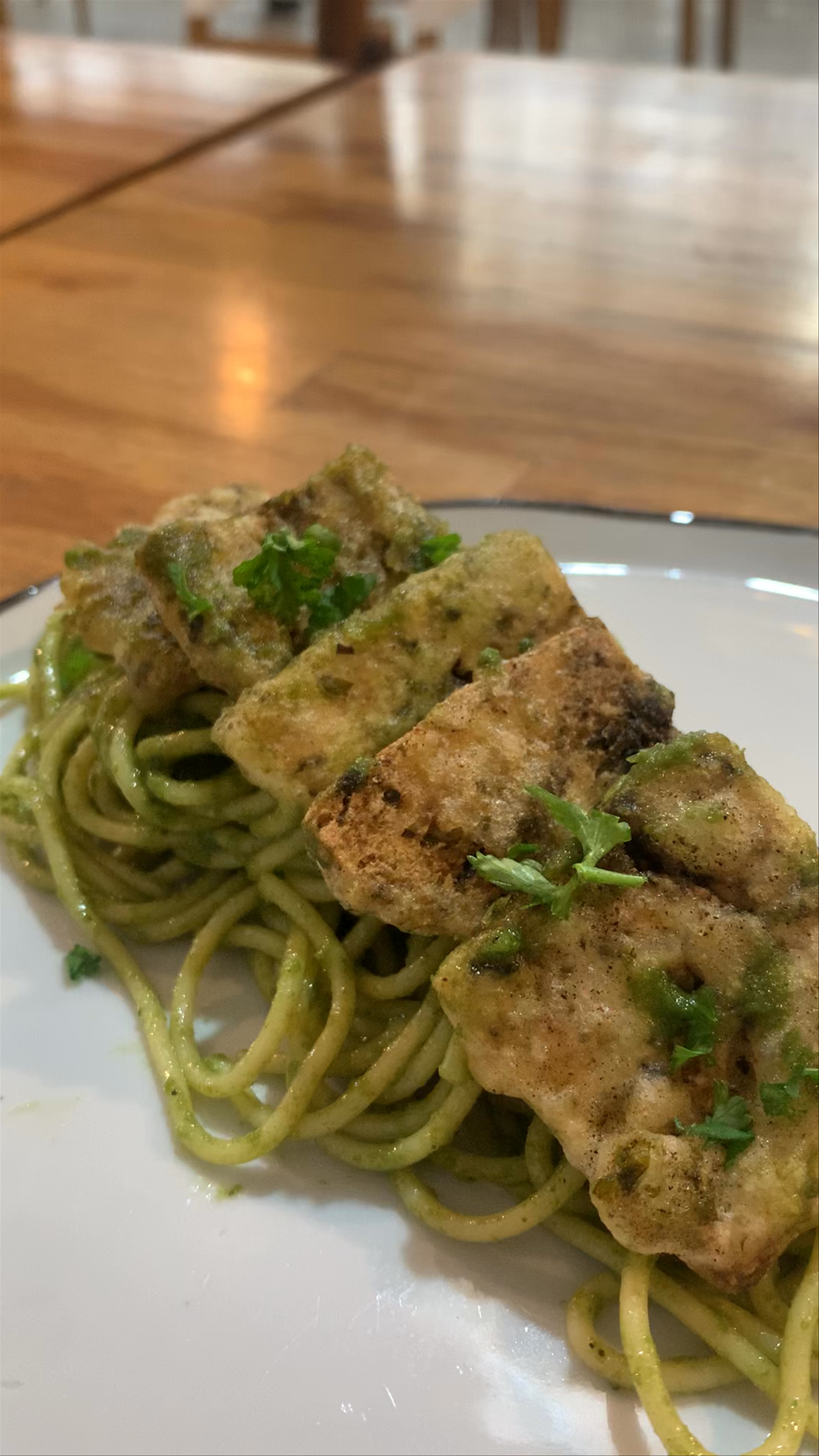 Cozy Café Ambiance with Green Pesto Pasta and Fried Tofu in Ayutthaya, Thailand