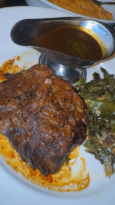 Prime One Twelve - Braised Slow Braised Mishima Ranch Wagyu Short Rib, Stone Ground Cheddar Grits and Braised Collard Greens - Steakhouses Near Me - Miami Beach, Florida