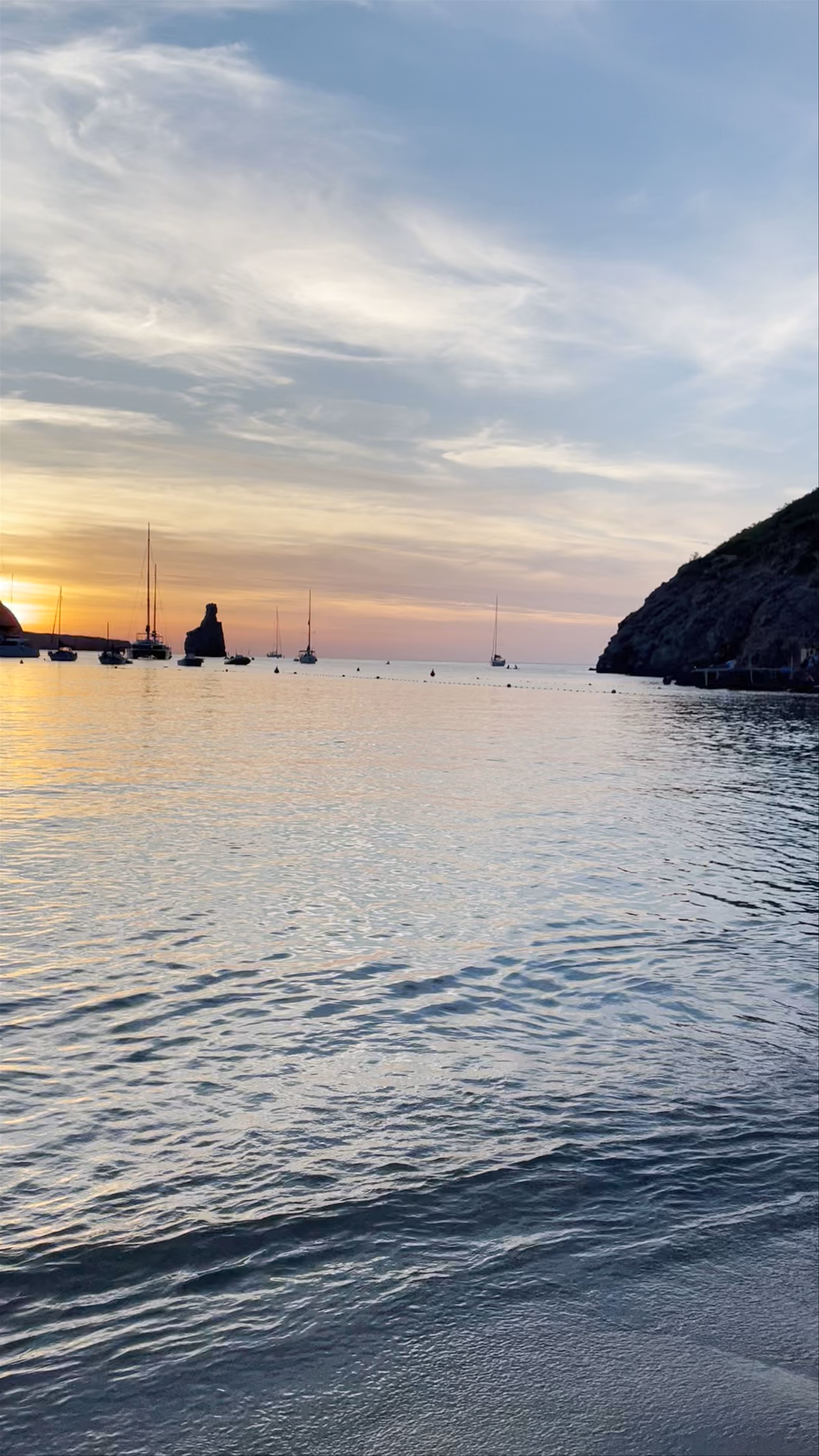 Serene Sunset Swim at Benirràs Beach, Ibiza