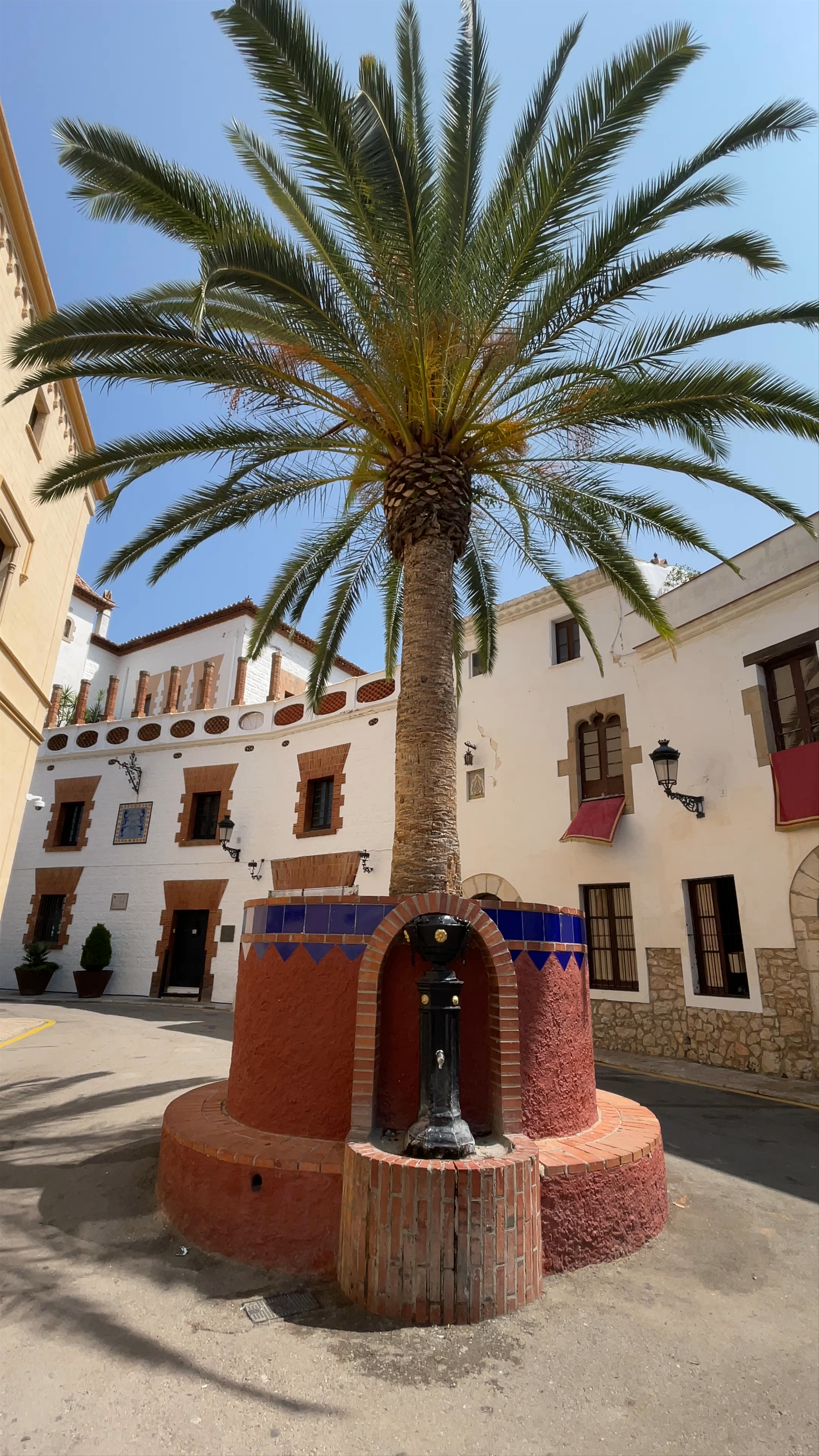 Discover the Sunny Charm of Sitges’ Historic Ajuntament Plaza