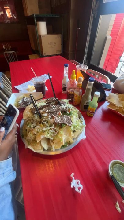 Taco Mama - Athens - Nachos! The portion can feed a group of 5! - Tacos Near Me - Athens, Georgia