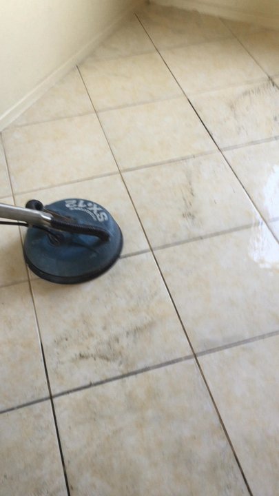 Aaron's Interior Cleaning - Steaming tile & grout. The first step - Carpet Cleaning Near Me