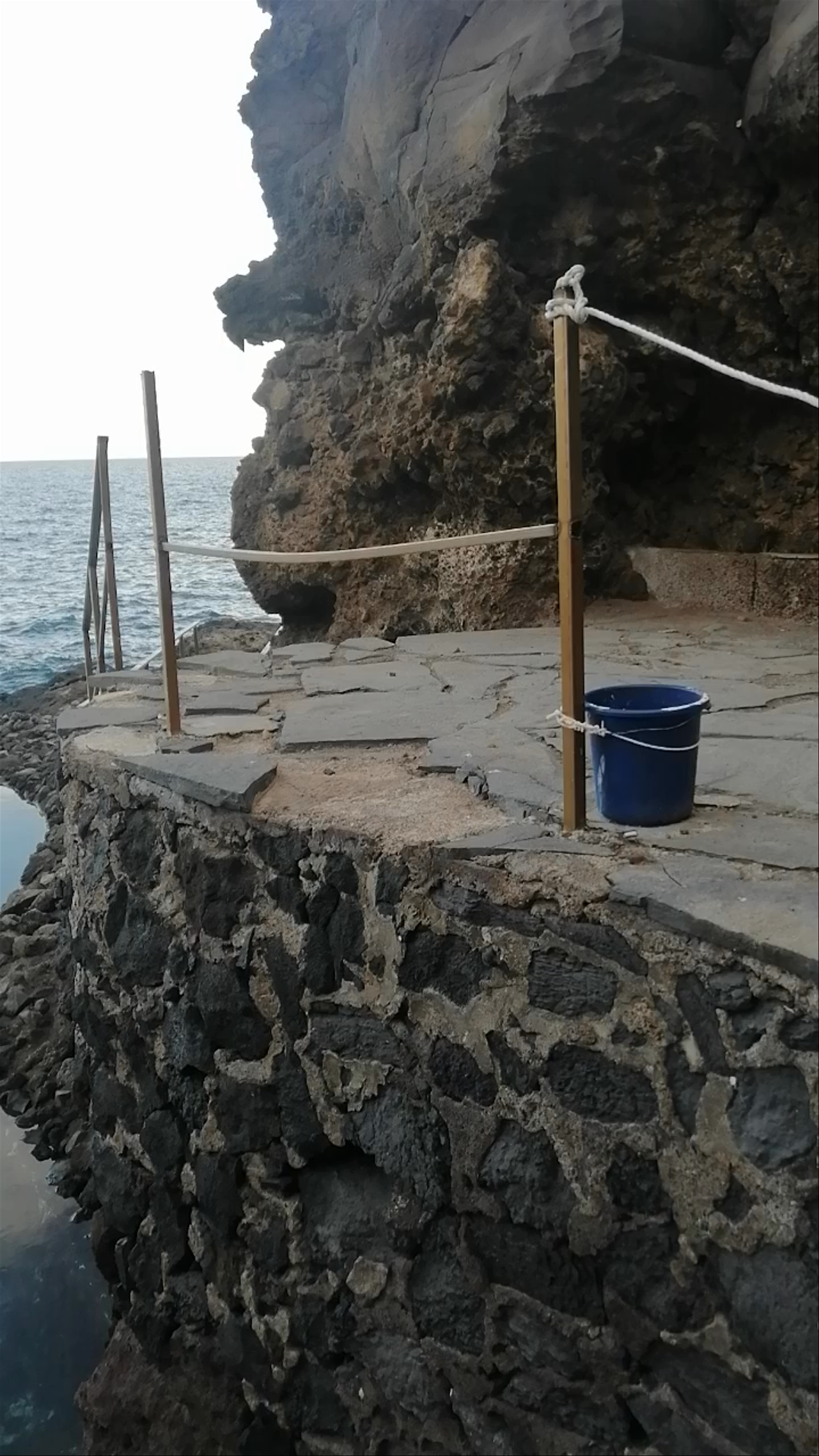 Serene Rocky Coastal Pool at Playa de las Caletas, Spain