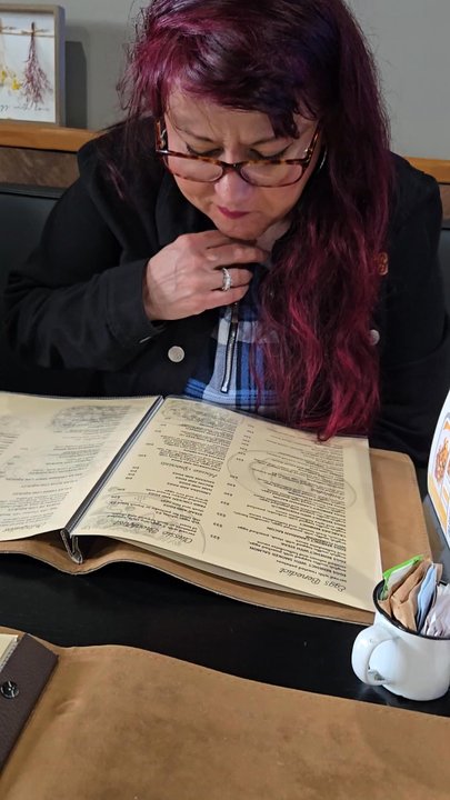 Papas & Eggs - My sis looking over the menu. - Breakfast & Brunch Near Me - Gilroy, California