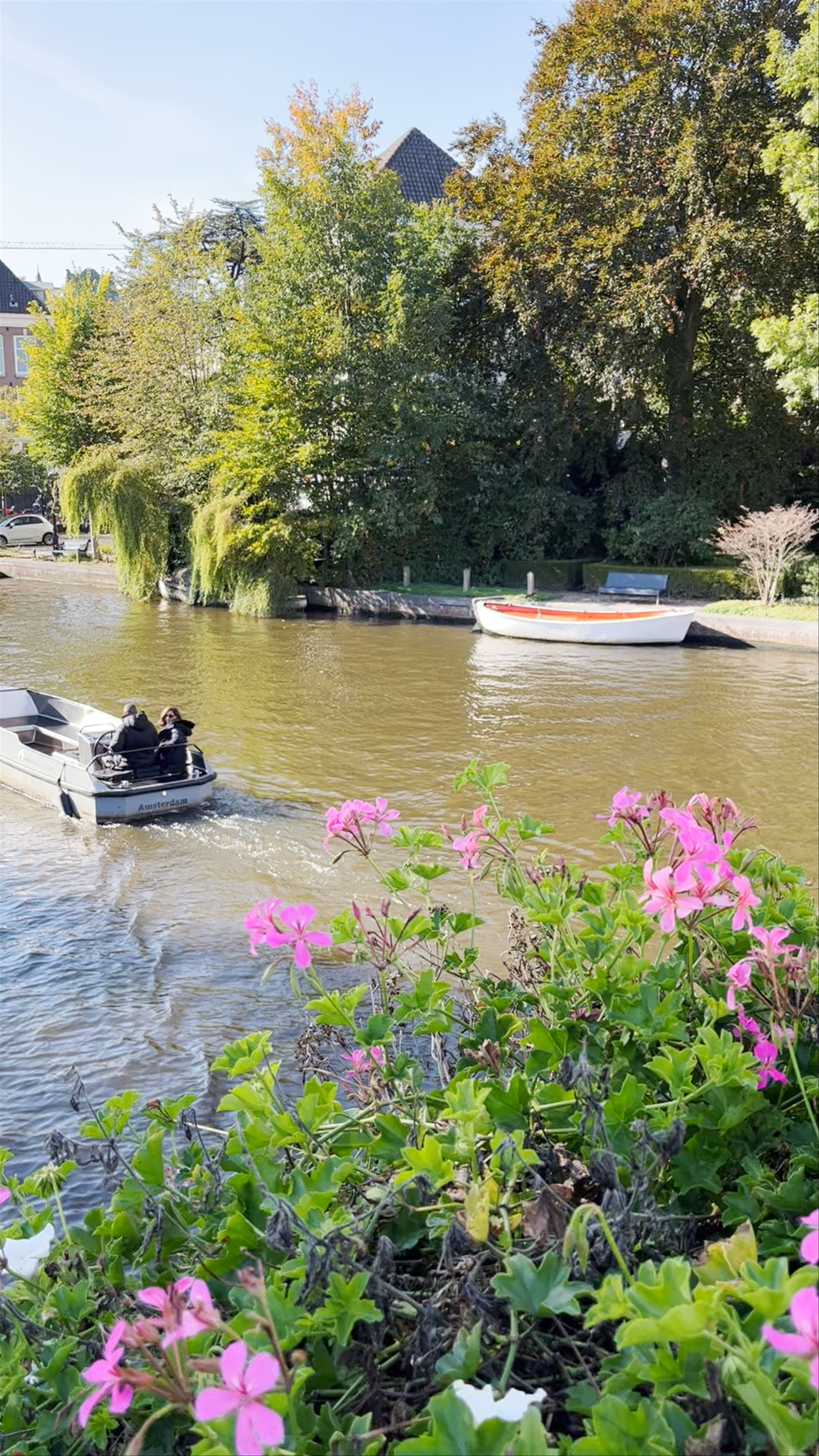 Serene Canal Ride through Amsterdam’s Autumn Charm