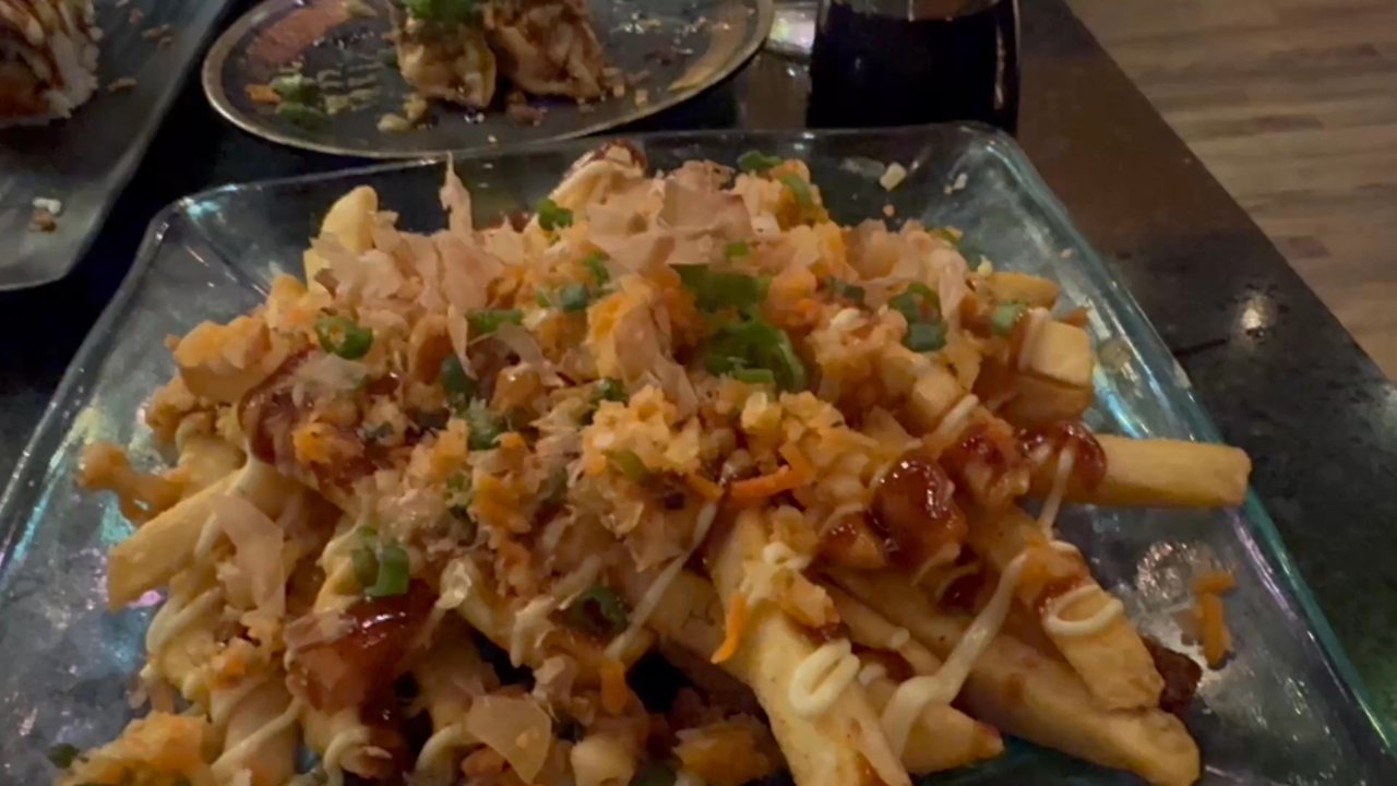 Colorado Sake - Okonomi fries with dancing bonito flakes - Breweries Near Me - Denver, Colorado