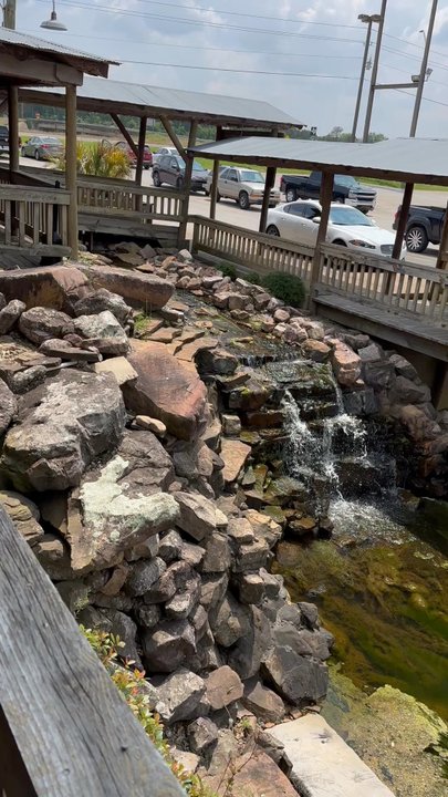 Catfish Village - The small waterfall in front. - Seafood Near Me - Waskom, Texas
