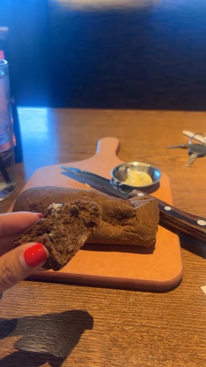 Outback Steakhouse - Yummy bread. My son enjoying the steak - Steakhouses Near Me - Miami, Florida