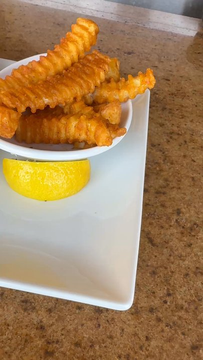Coconuts On The Beach - Blackened Mahi Sandwich - Bars Near Me - Cocoa Beach, Florida