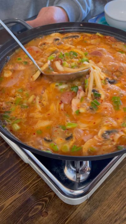 Angry Chicken - Army Stew bubbling away tableside! - Chicken Wings Near Me - Aurora, Colorado