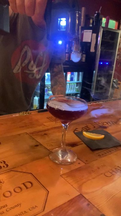 The Grape Escape - Smoke on top of a Pomegranate Martini - Wine Bars Near Me - Galena, Illinois