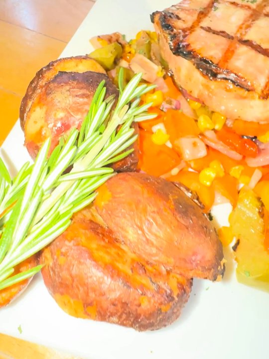 Fire By The Monon - Grilled pork chop. It comes with asparagus but I substituted that for roasted vegetables. Very good! - American Near Me - Indianapolis, Indiana