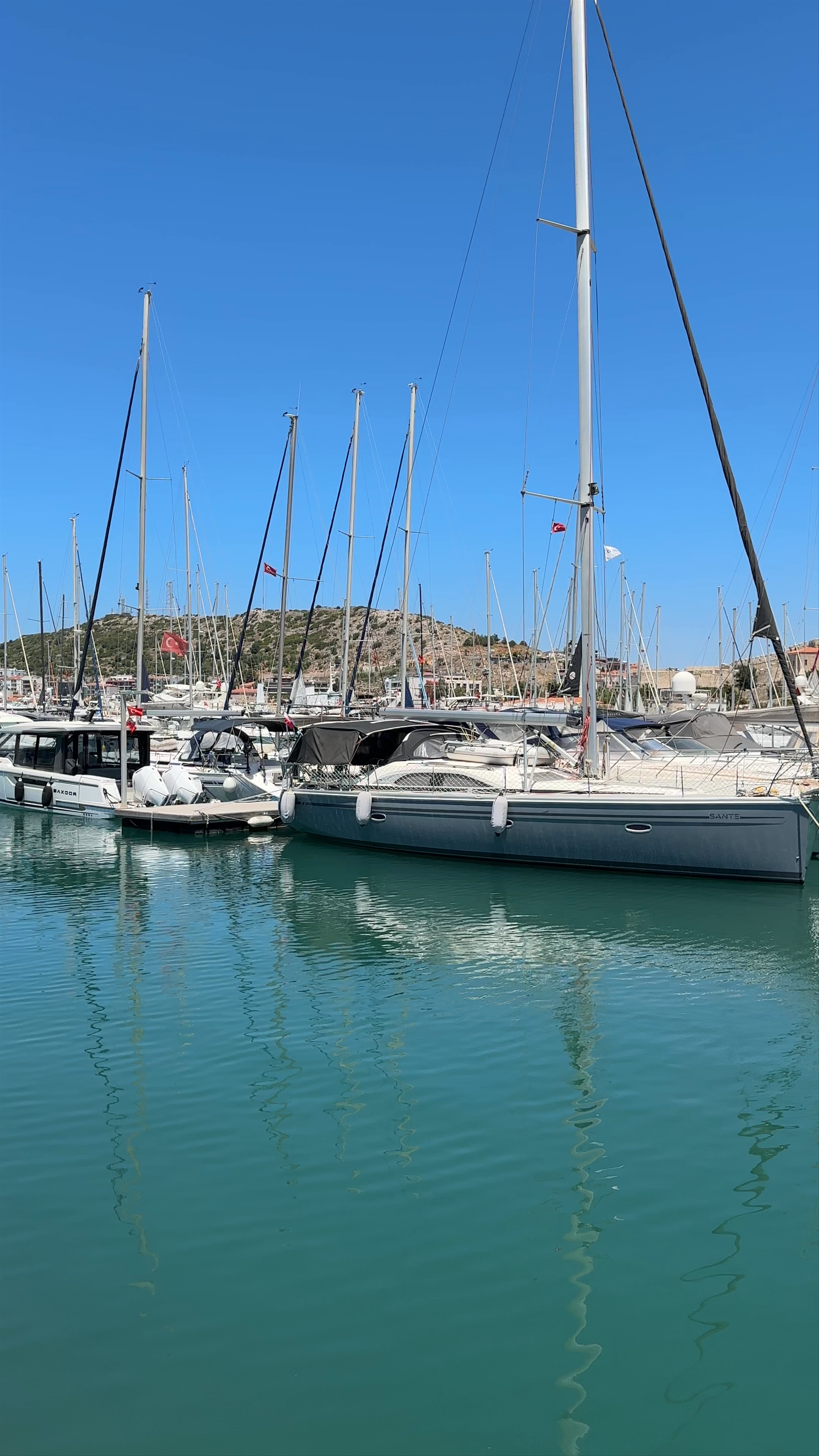 Serene Sailing and Sunlight at Çeşme Marina in Musalla, İzmir