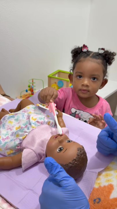 Adorable Smiles Pediatric Dentistry - This patient was nervous and she asked to brush her doll teeth first before her teeth. We love it when patient are engaged about dental care - Pediatric Dentists Near Me - Corinth, Texas