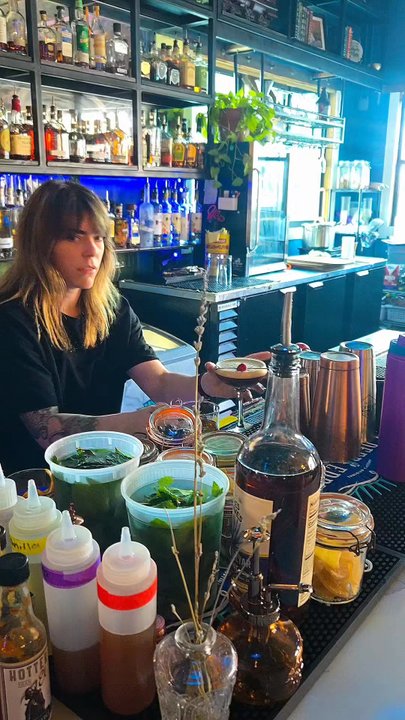 The Basin - One of the lovely bartenders. I believe her name is Bailee. She was very sweet and made sure to partake with a smile in the video - Bars Near Me - Sanford, Florida