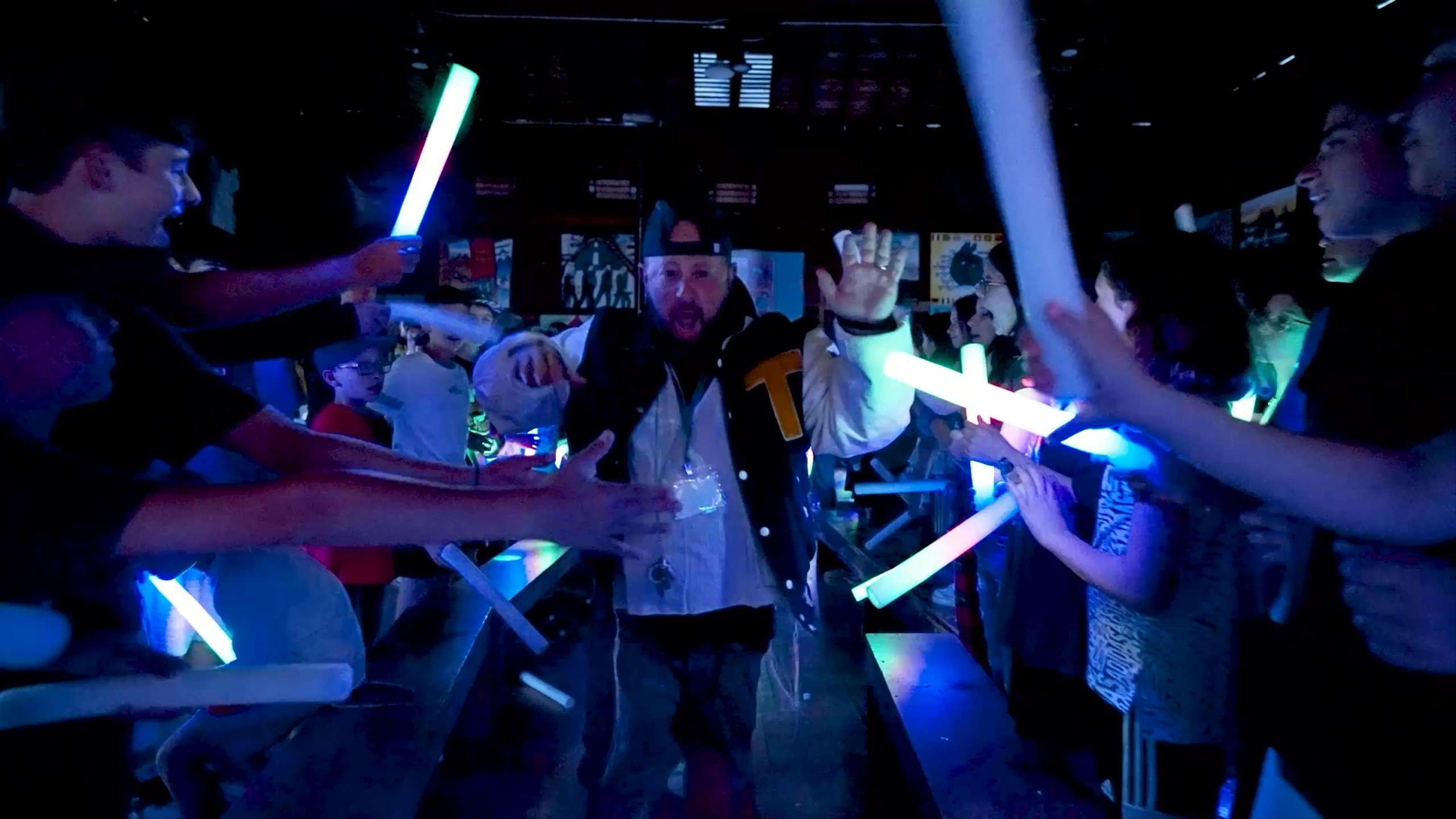 A live event crowd lit in blue from the JSG Studios showreel